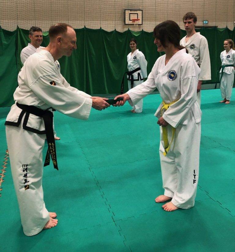 Surrey Taekwon-Do lady receiving an award